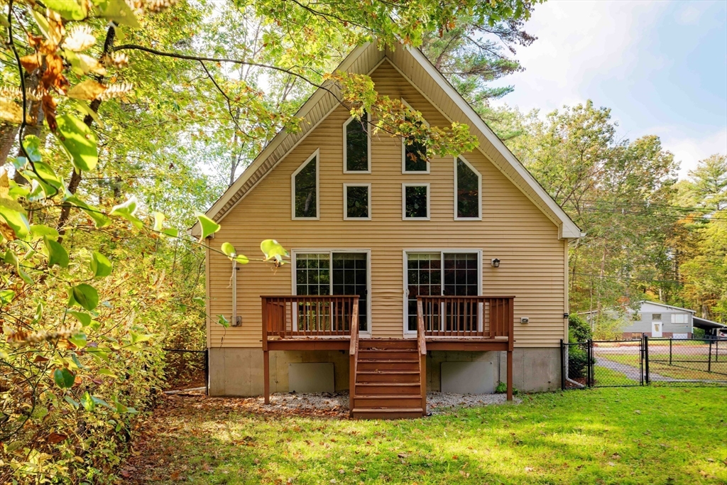 267 Carlisle Road Bedford, MA 01730 - Photo 13 of 32 a view of house with a yard
