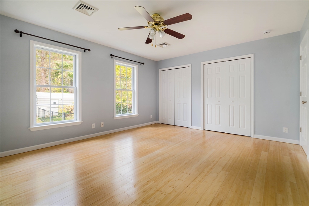 267 Carlisle Road Bedford, MA 01730 - Photo 21 of 32 wooden floor in an empty room with a window
