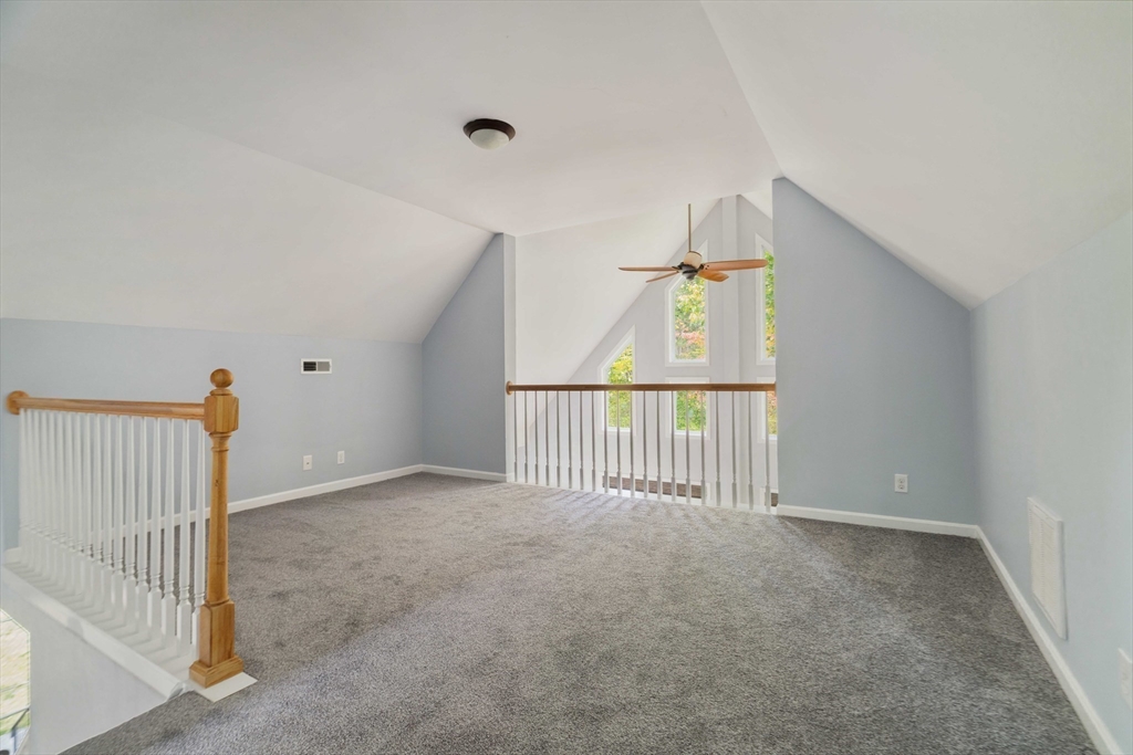 267 Carlisle Road Bedford, MA 01730 - Photo 24 of 32 a view of a hallway with a window