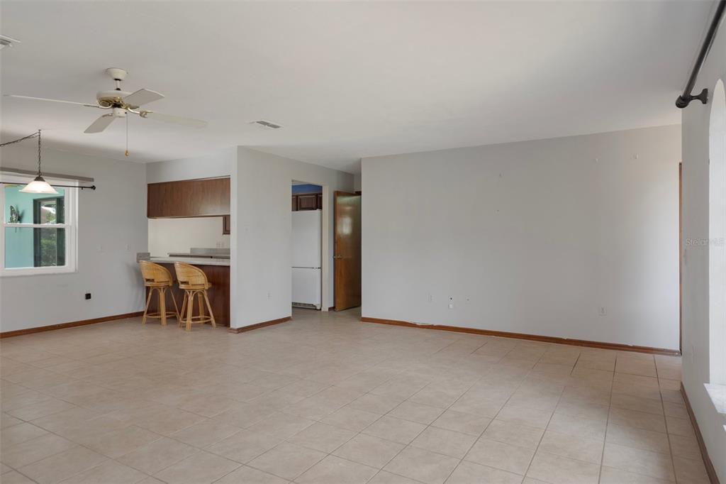 8332 Berkeley Manor Boulevard Spring Hill, FL 34606 - Photo 17 of 45 a view of an empty room with a window
