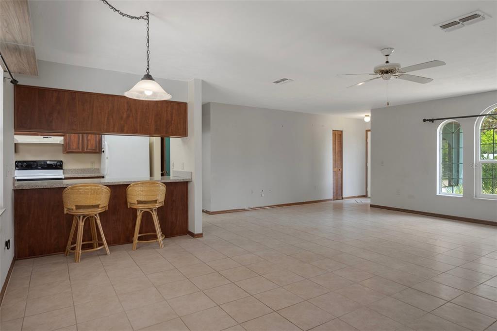 8332 Berkeley Manor Boulevard Spring Hill, FL 34606 - Photo 20 of 45 a view of kitchen with furniture and window