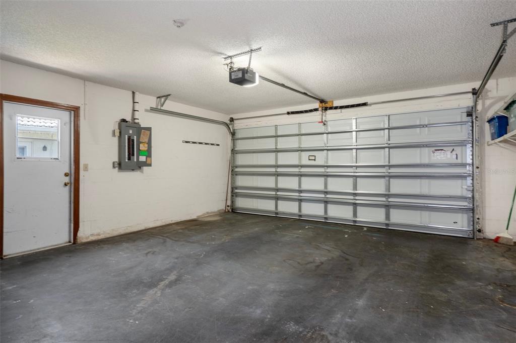8332 Berkeley Manor Boulevard Spring Hill, FL 34606 - Photo 37 of 45 a view of a garage