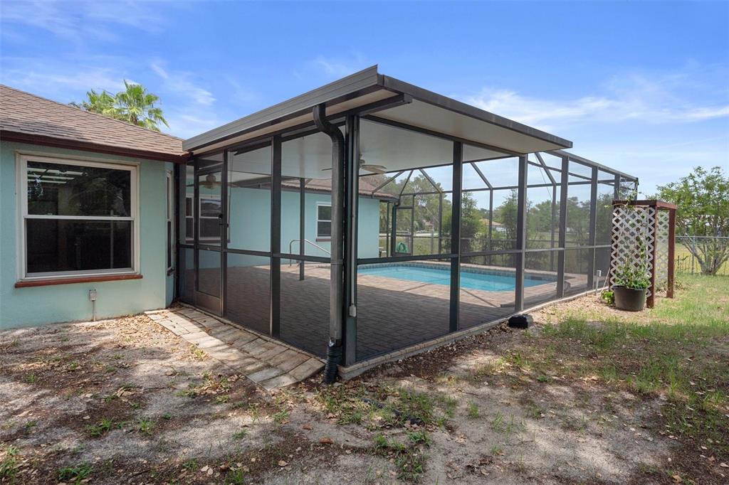 8332 Berkeley Manor Boulevard Spring Hill, FL 34606 - Photo 43 of 45 a view of backyard of the house