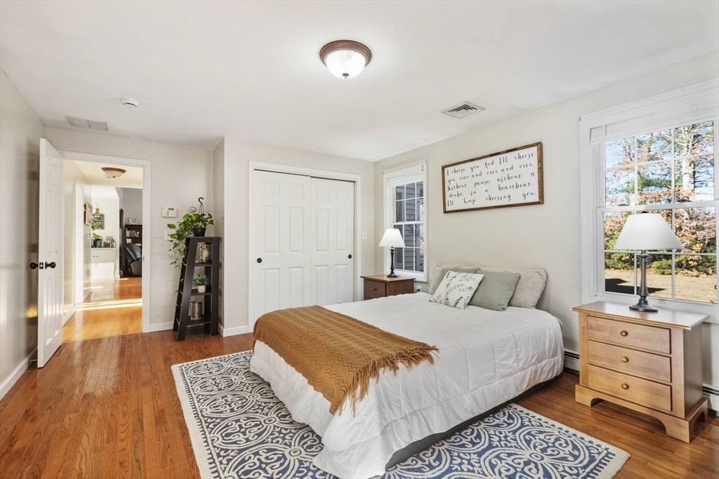 460 High Street Rochester, MA 02770 - Photo 18 of 31 a bedroom with a large bed and a dresser