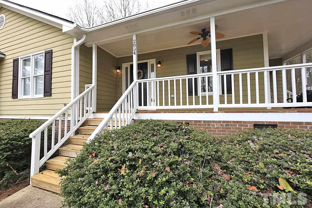2804 Livery Way Raleigh, NC 27603 - Photo 3 of 24 a view of a house with wooden fence