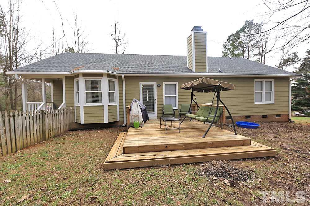 2804 Livery Way Raleigh, NC 27603 - Photo 22 of 24 a view of a house with backyard and porch