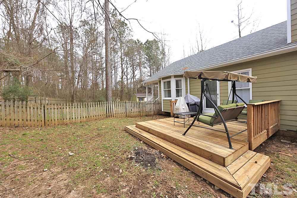 2804 Livery Way Raleigh, NC 27603 - Photo 23 of 24 a view of a house with backyard and sitting area