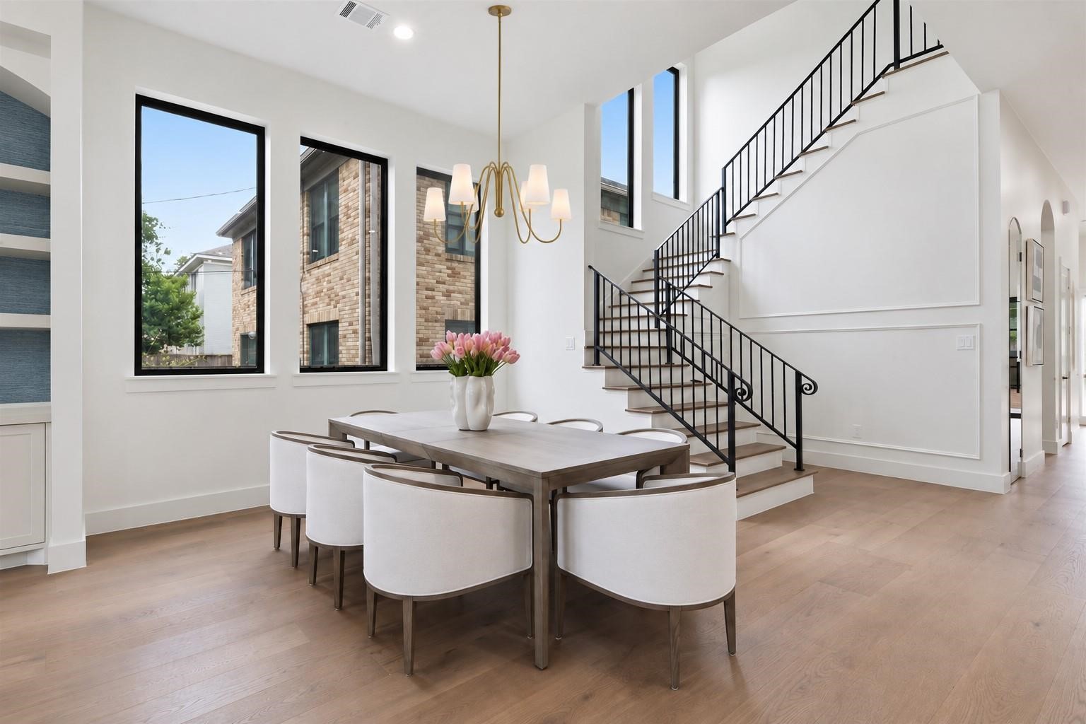 2325 Wroxton Road Houston, TX 77005 - Photo 15 of 34 Light filled beautiful dinning room space with extensive windows
