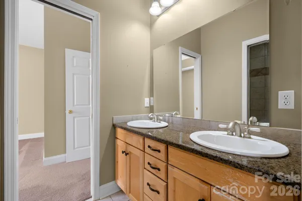 a bathroom with a toilet and a bathtub
