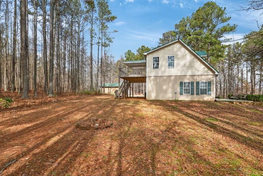 1800 Mandeville Road Bremen, GA 30110 - Photo 12 of 45 a view of a house with backyard and trees