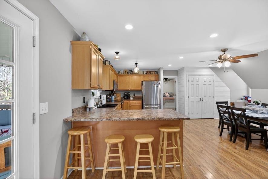 1800 Mandeville Road Bremen, GA 30110 - Photo 21 of 45 a kitchen with stainless steel appliances kitchen island granite countertop a table chairs and a refrigerator