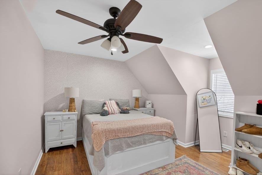 1800 Mandeville Road Bremen, GA 30110 - Photo 27 of 45 a bedroom with a bed and a chandelier