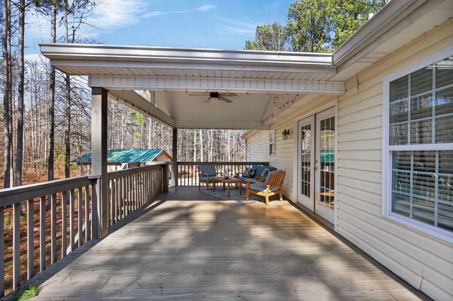 1800 Mandeville Road Bremen, GA 30110 - Photo 34 of 45 a view of a porch with chairs and backyard