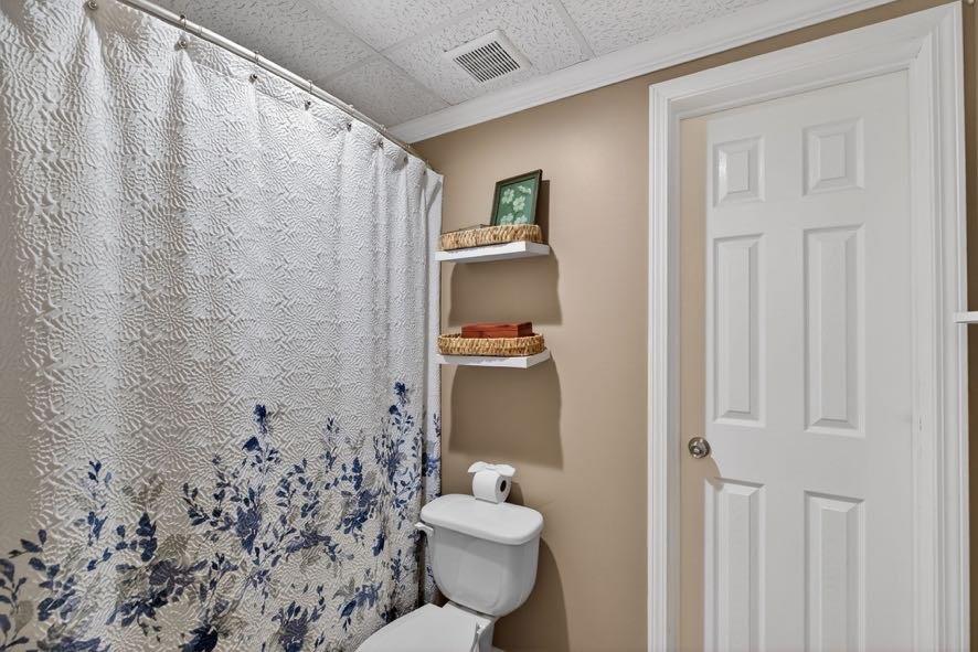1800 Mandeville Road Bremen, GA 30110 - Photo 8 of 45 a bathroom with a granite countertop sink and a toilet