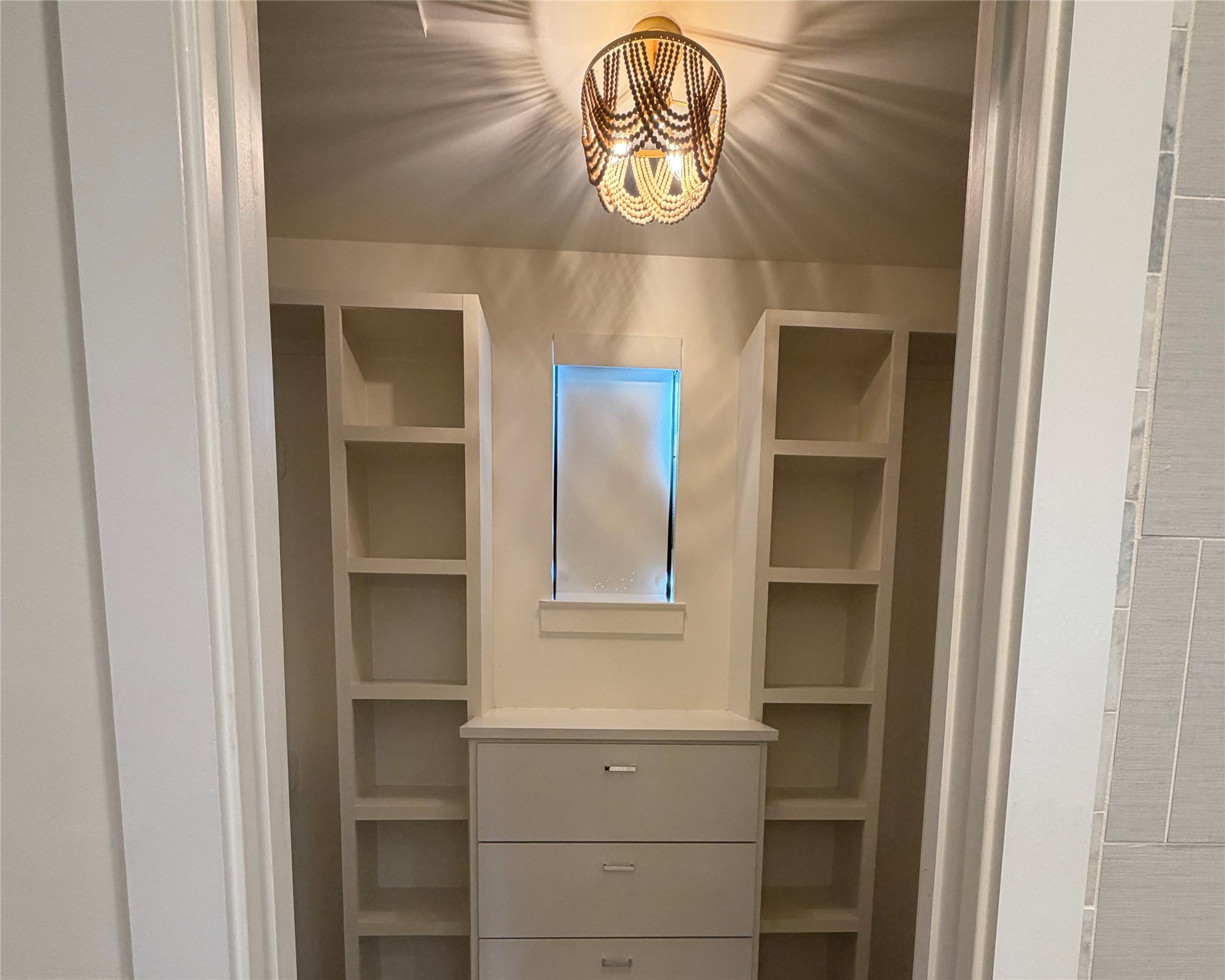 1515 Hether Street, Unit B Austin, TX 78704 - Photo 16 of 30 A well-organized custom closet system provides ample storage for any wardrobe.