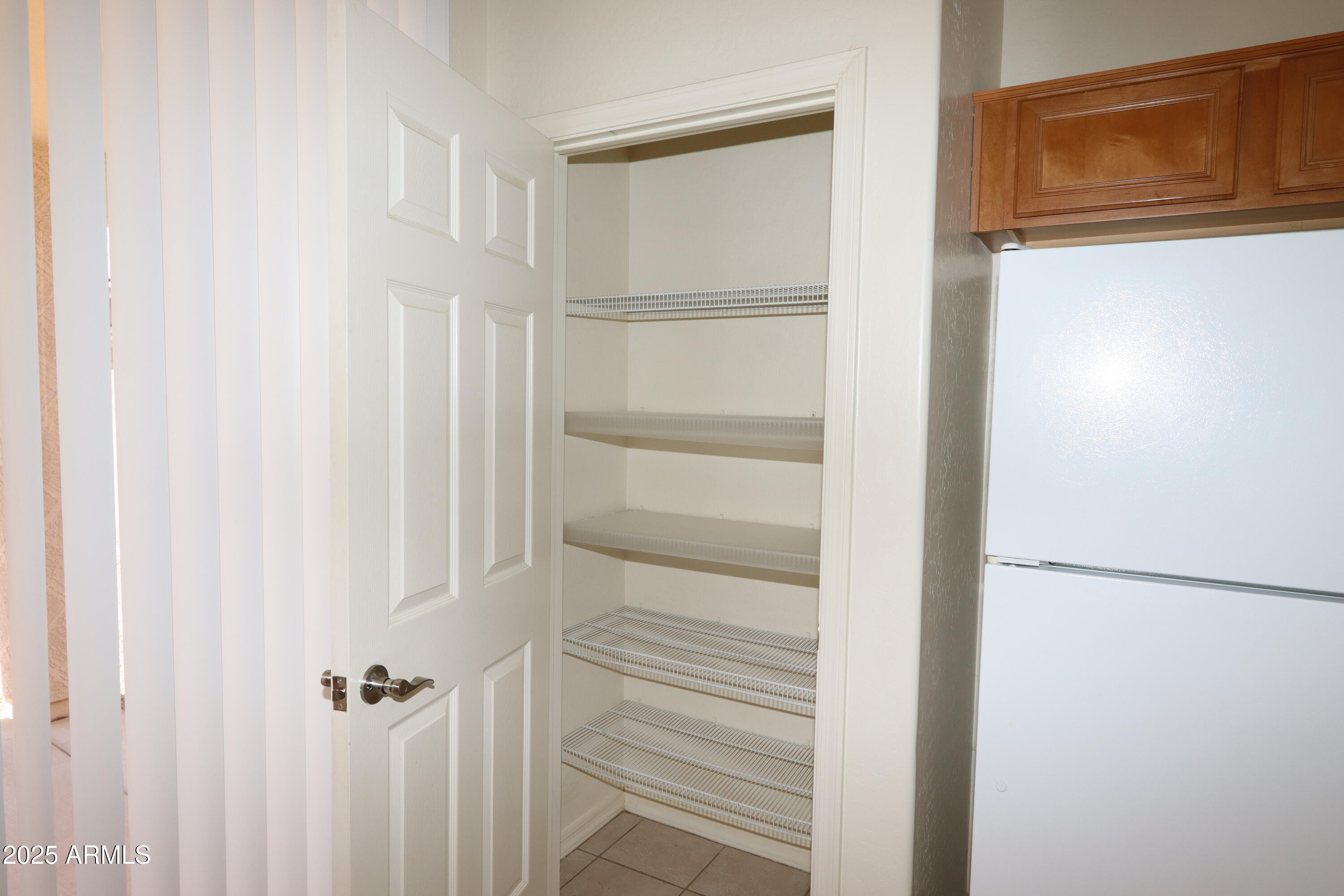 14298 West Verde Lane Goodyear, AZ 85395 - Photo 11 of 21 a view of walk in closet