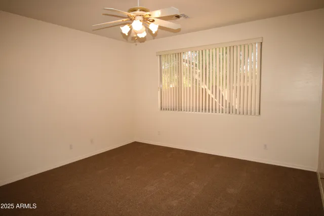 a bathroom with a double vanity sink and mirror