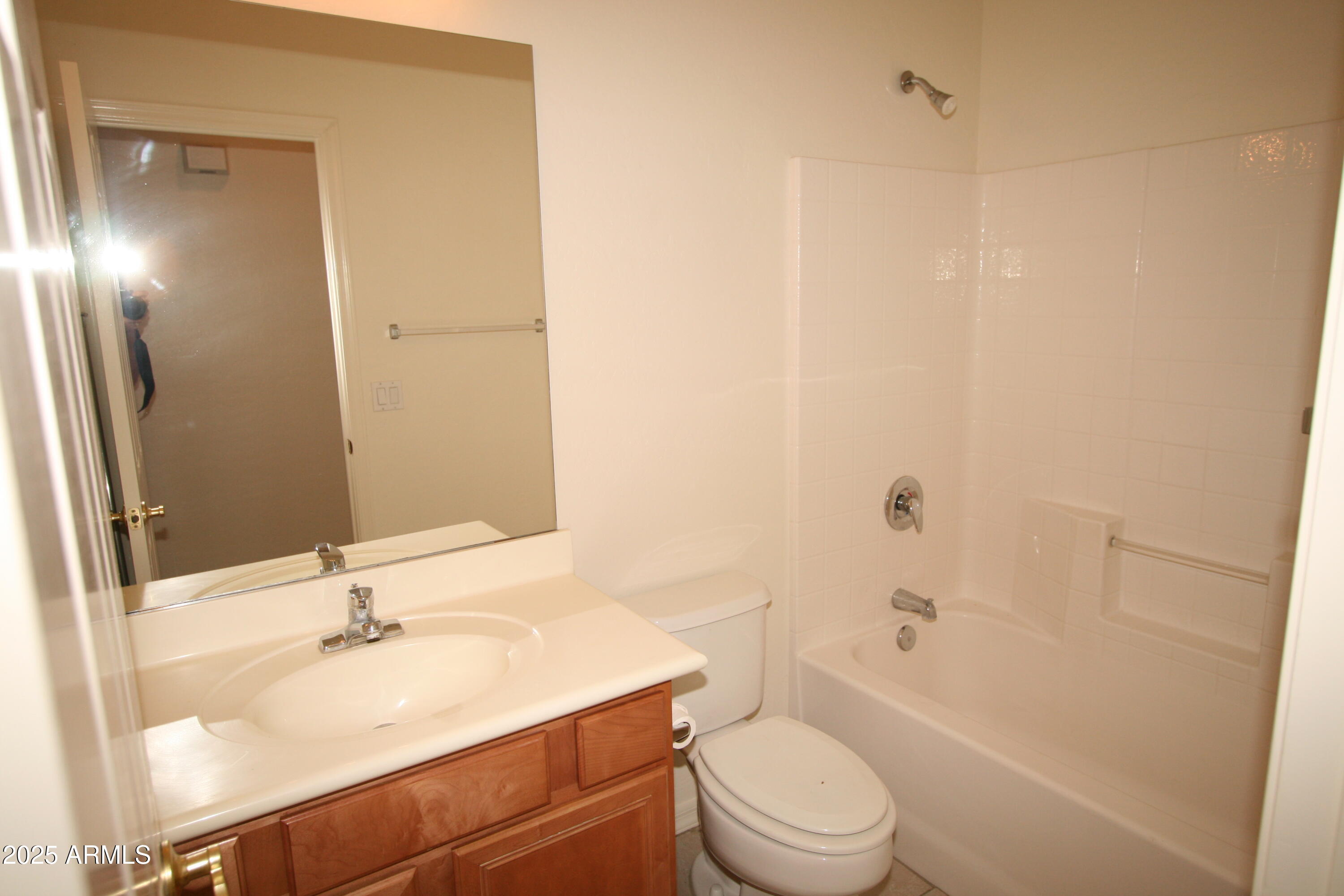 14298 West Verde Lane Goodyear, AZ 85395 - Photo 17 of 21 a bathroom with a sink a toilet and shower