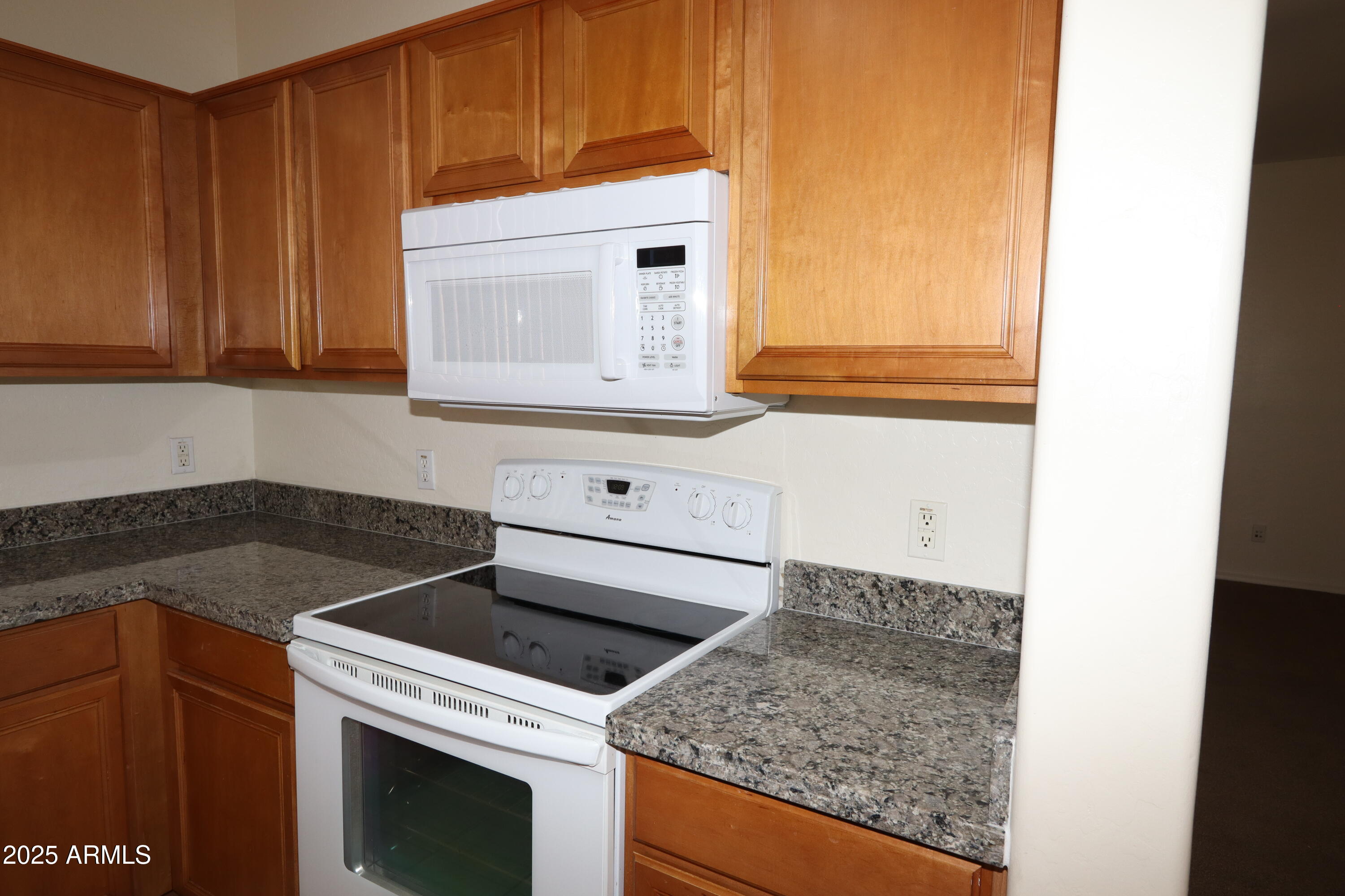 14298 West Verde Lane Goodyear, AZ 85395 - Photo 7 of 21 a kitchen that has a sink and a stove