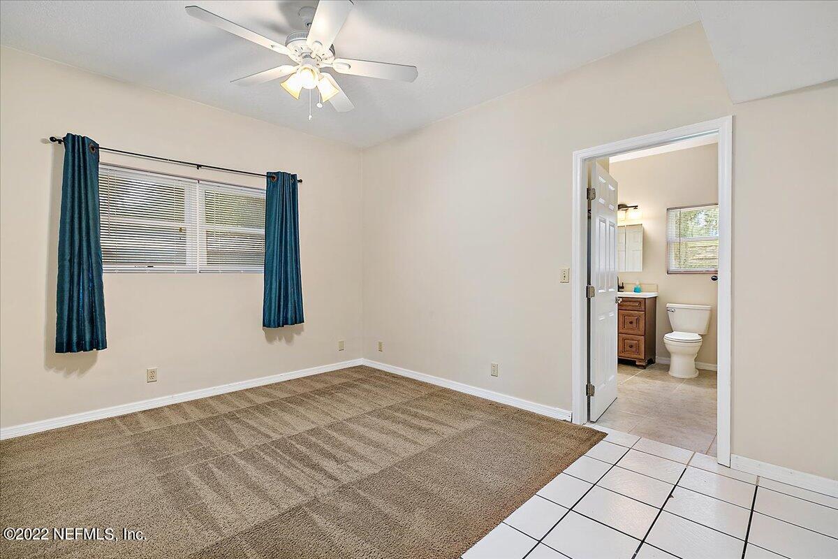 5261 Ridgecrest Avenue Jacksonville, FL 32207 - Photo 13 of 30 Downstairs Bedroom Suite