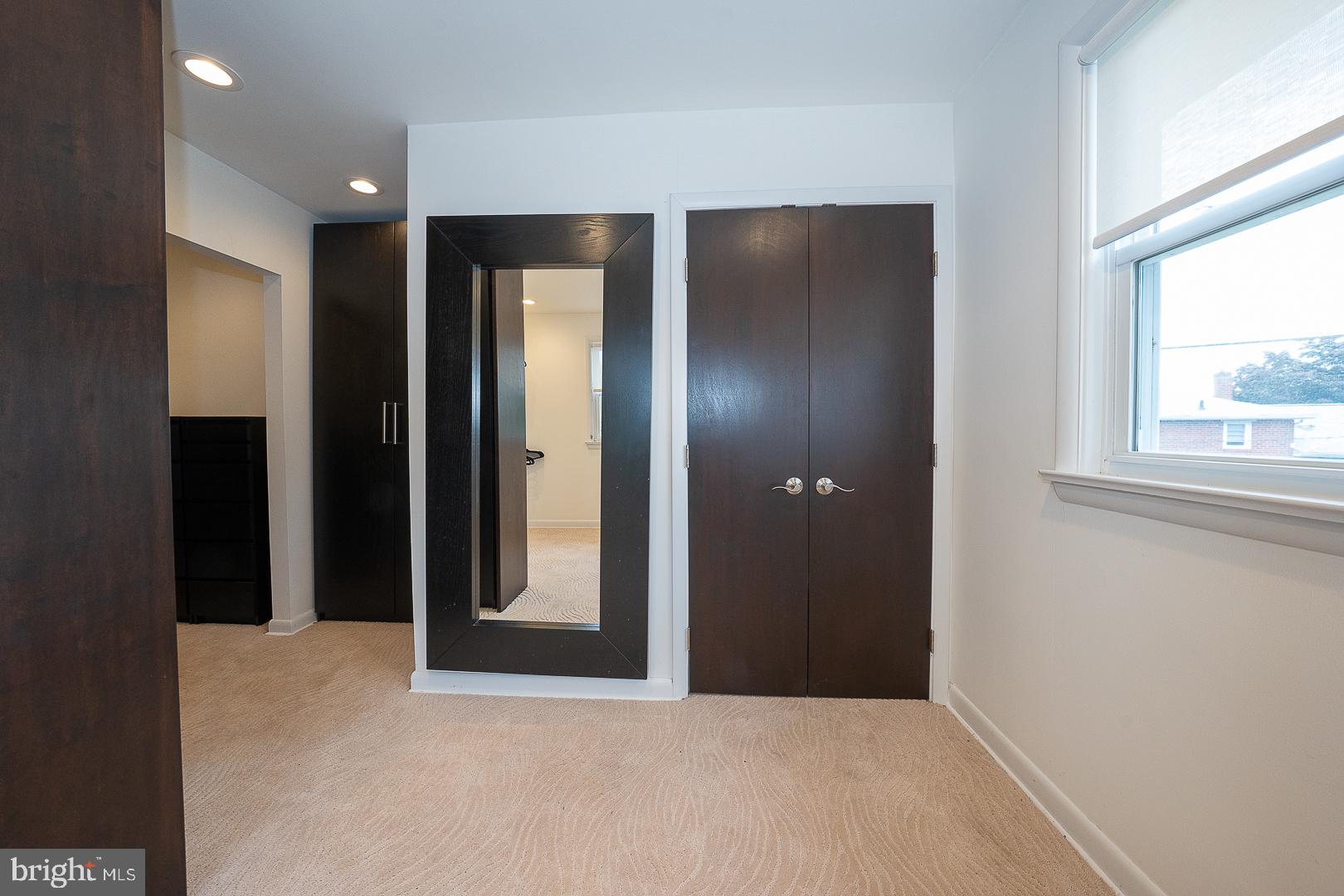 20 Fairview Road Swarthmore, PA 19081 - Photo 31 of 57 a view of hallway with a large mirror