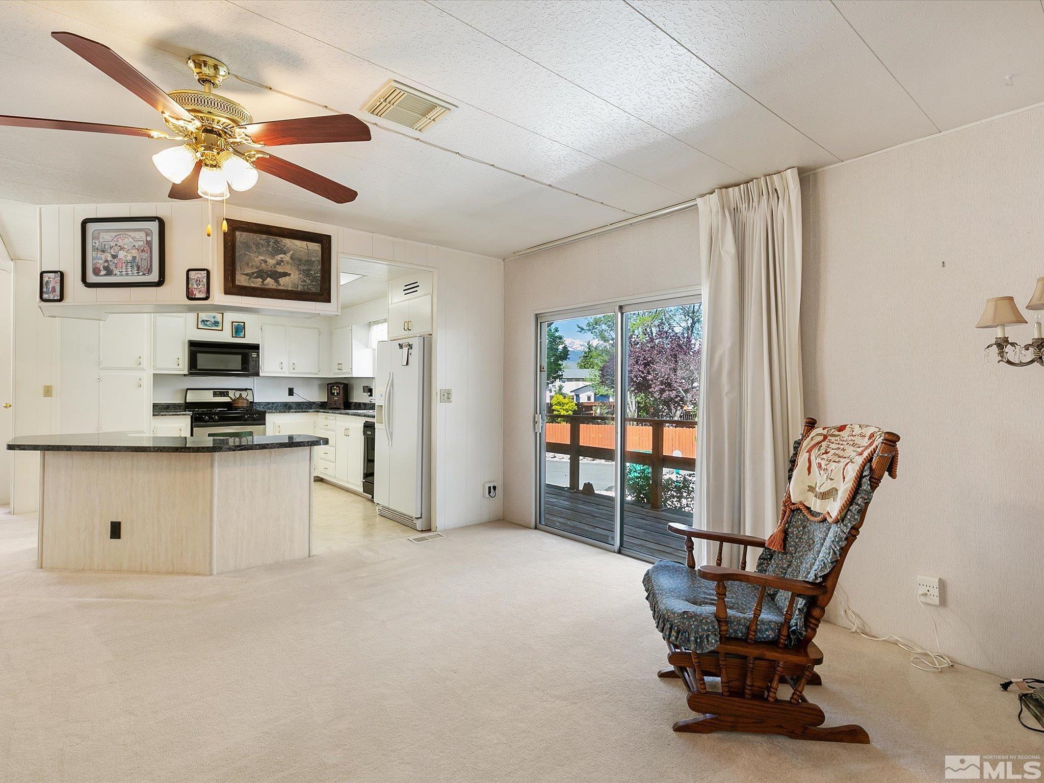 15010 Vega Street Reno, NV 89521 - Photo 14 of 30 a view of kitchen with furniture and window
