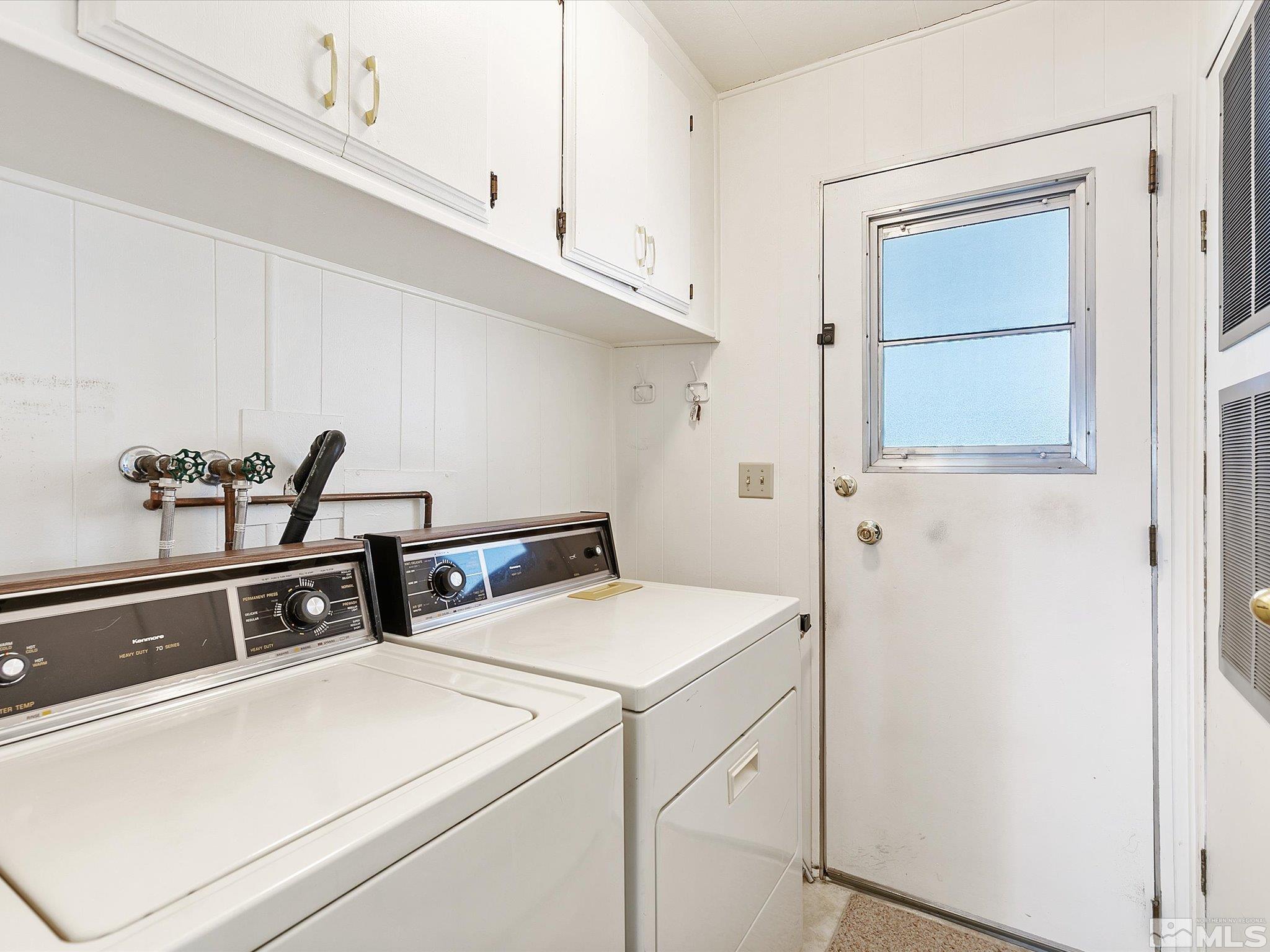 15010 Vega Street Reno, NV 89521 - Photo 24 of 30 a utility room with dryer and washer
