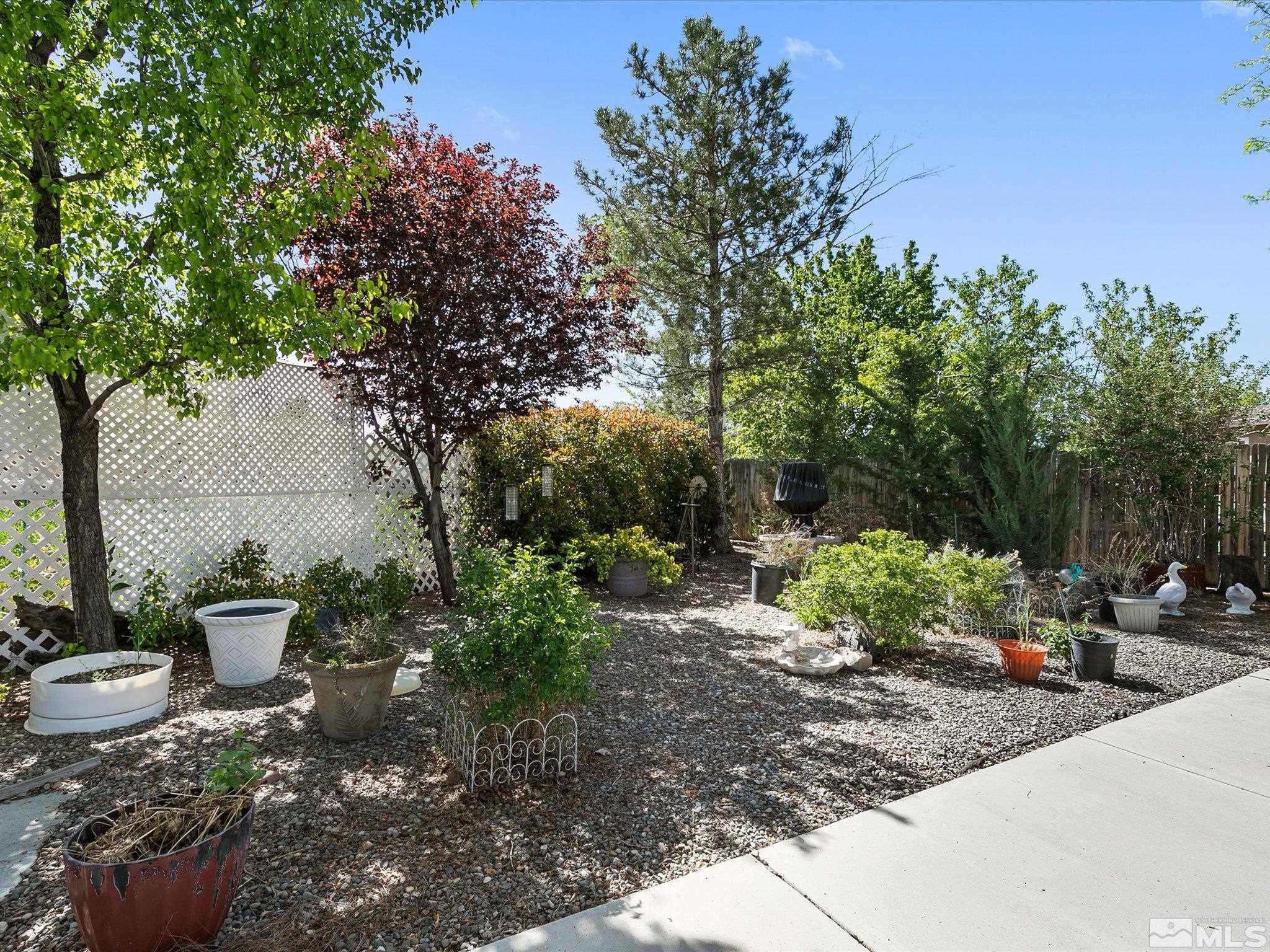 15010 Vega Street Reno, NV 89521 - Photo 28 of 30 a view of a backyard with sitting area