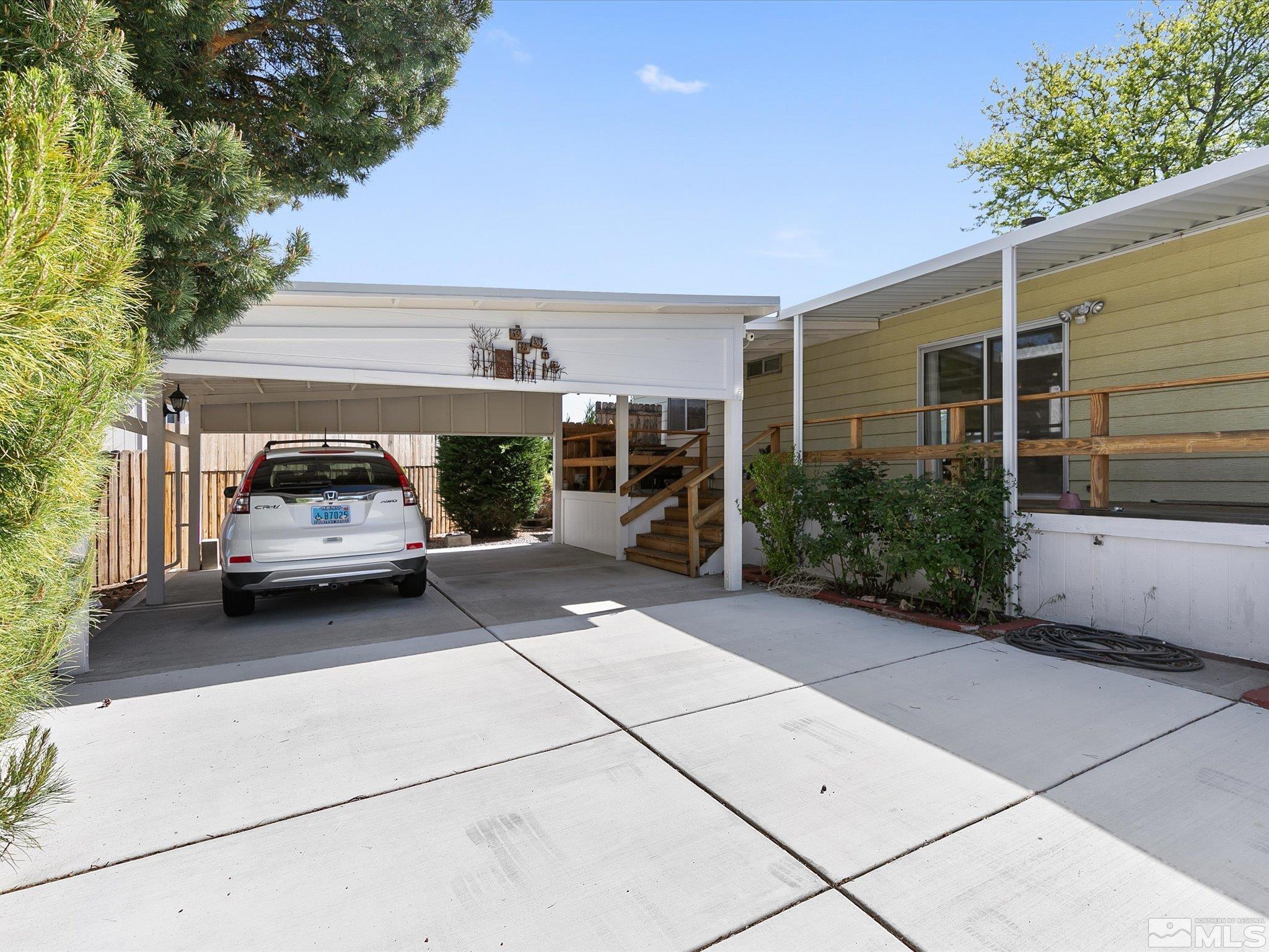 15010 Vega Street Reno, NV 89521 - Photo 3 of 30 a car parked in front of a house