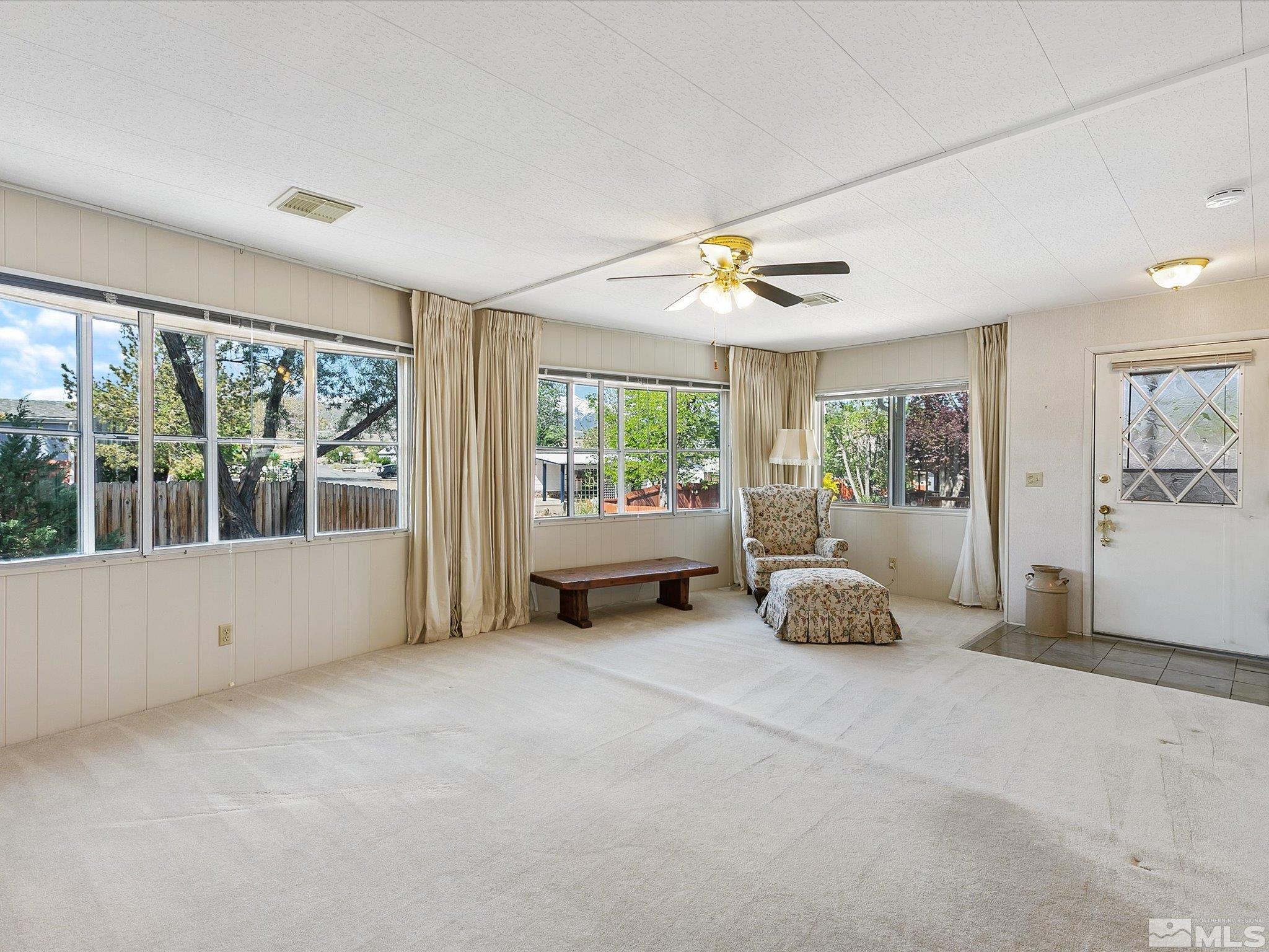 15010 Vega Street Reno, NV 89521 - Photo 7 of 30 a living room with furniture and windows