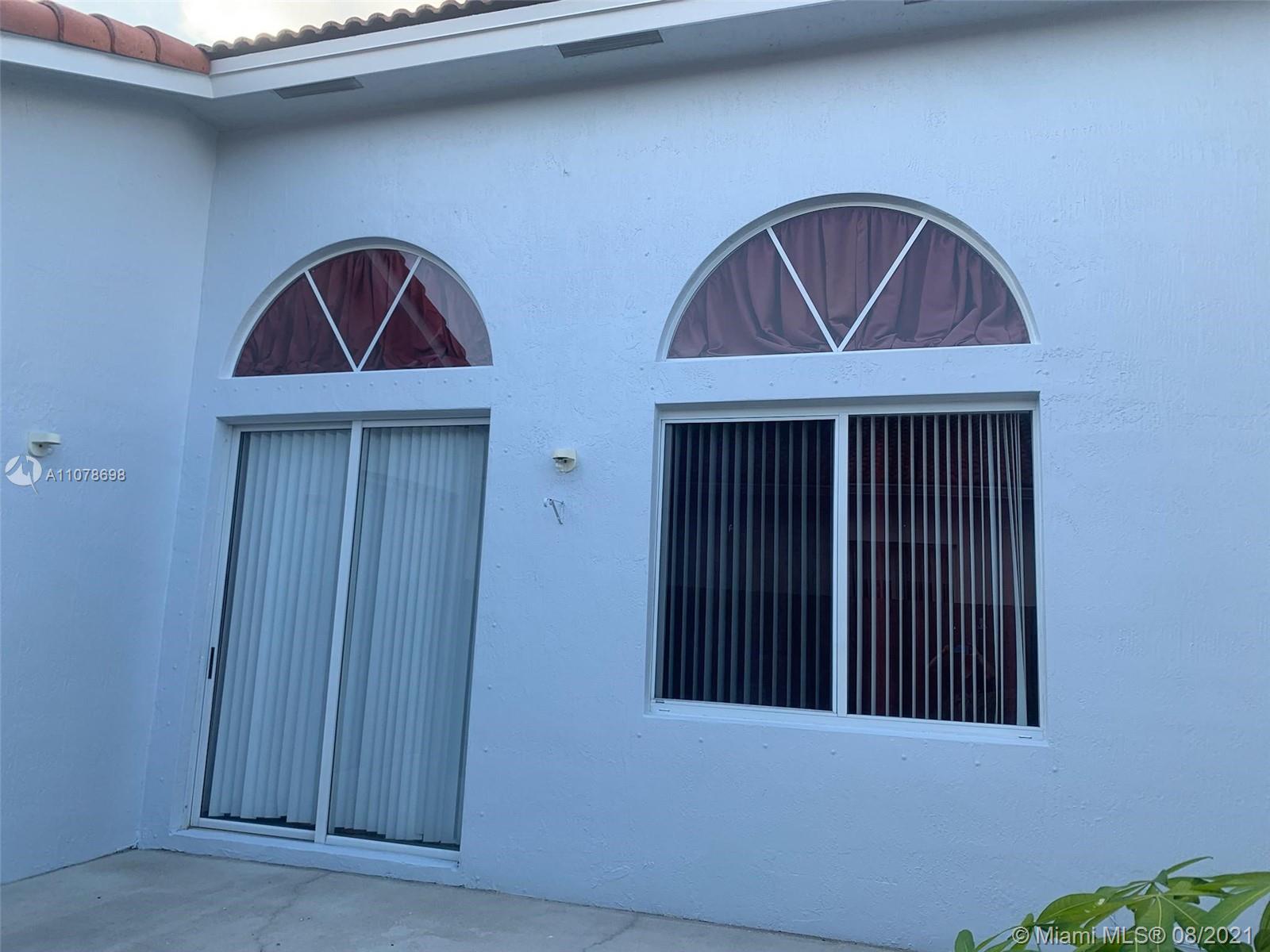 1830 Southeast 20th Road Homestead, FL 33035 - Photo 5 of 6 a view of front door of a house