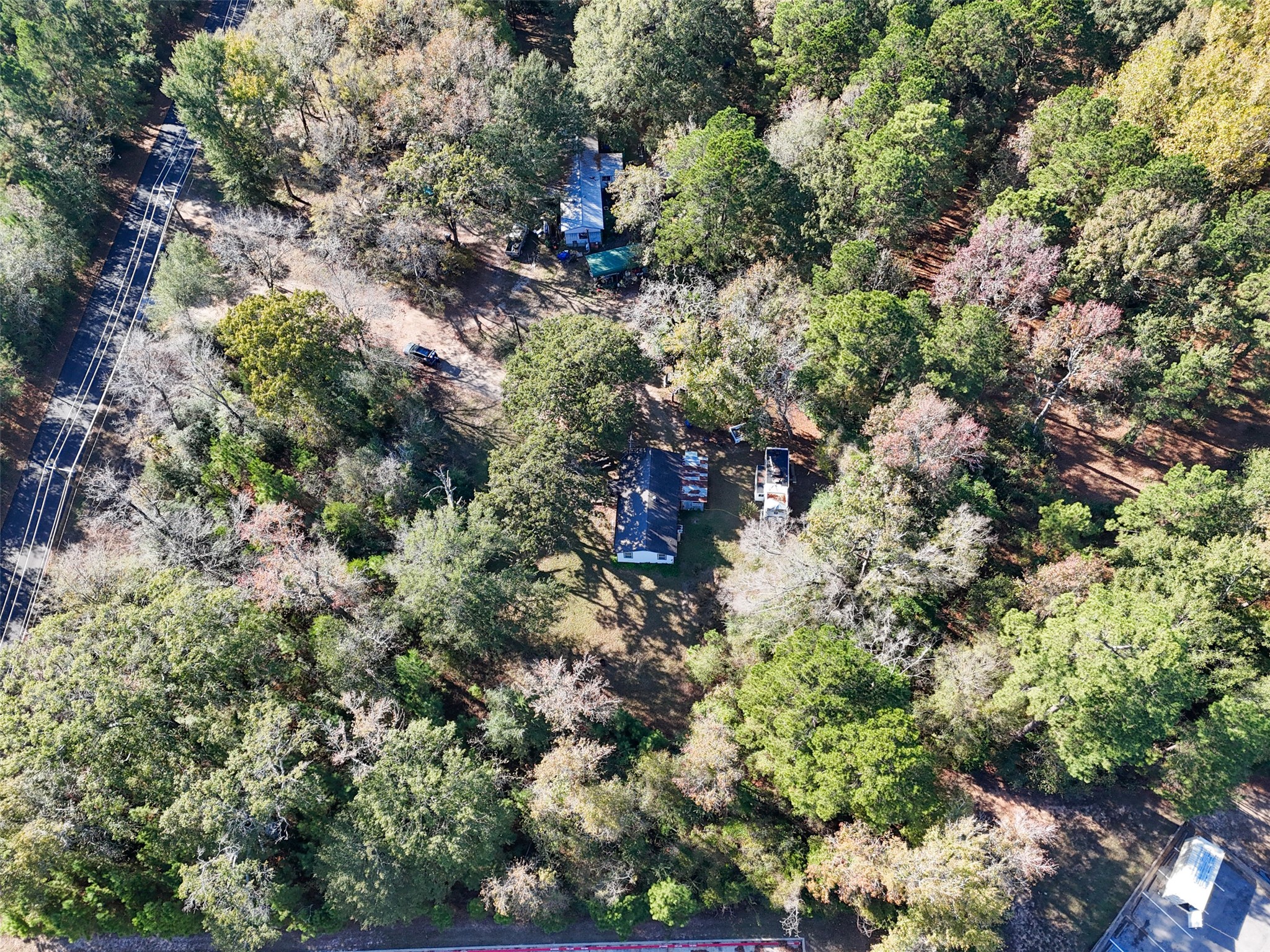 3349 Collard Road Huntsville, TX 77340 - Photo 4 of 22 a view of a house with a tree