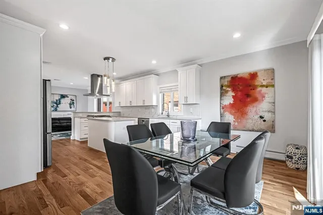 a spacious bedroom with a bed and a window