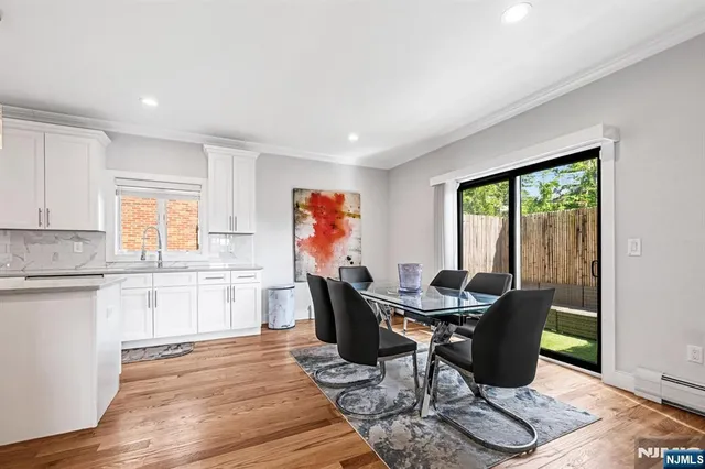 a bathroom with a toilet a sink and a shower