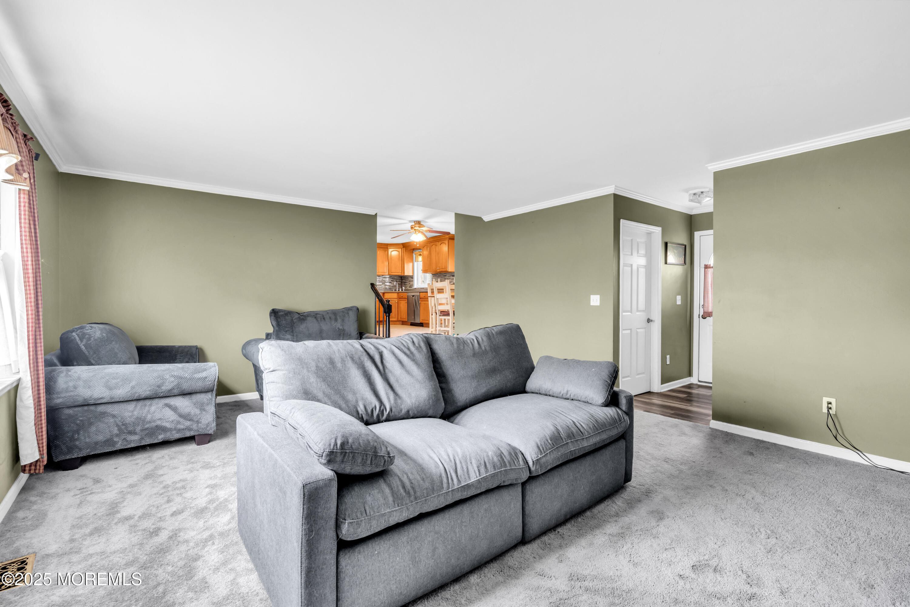 606 E Road Middletown, NJ 07748 - Photo 12 of 28 a living room with furniture and a couch