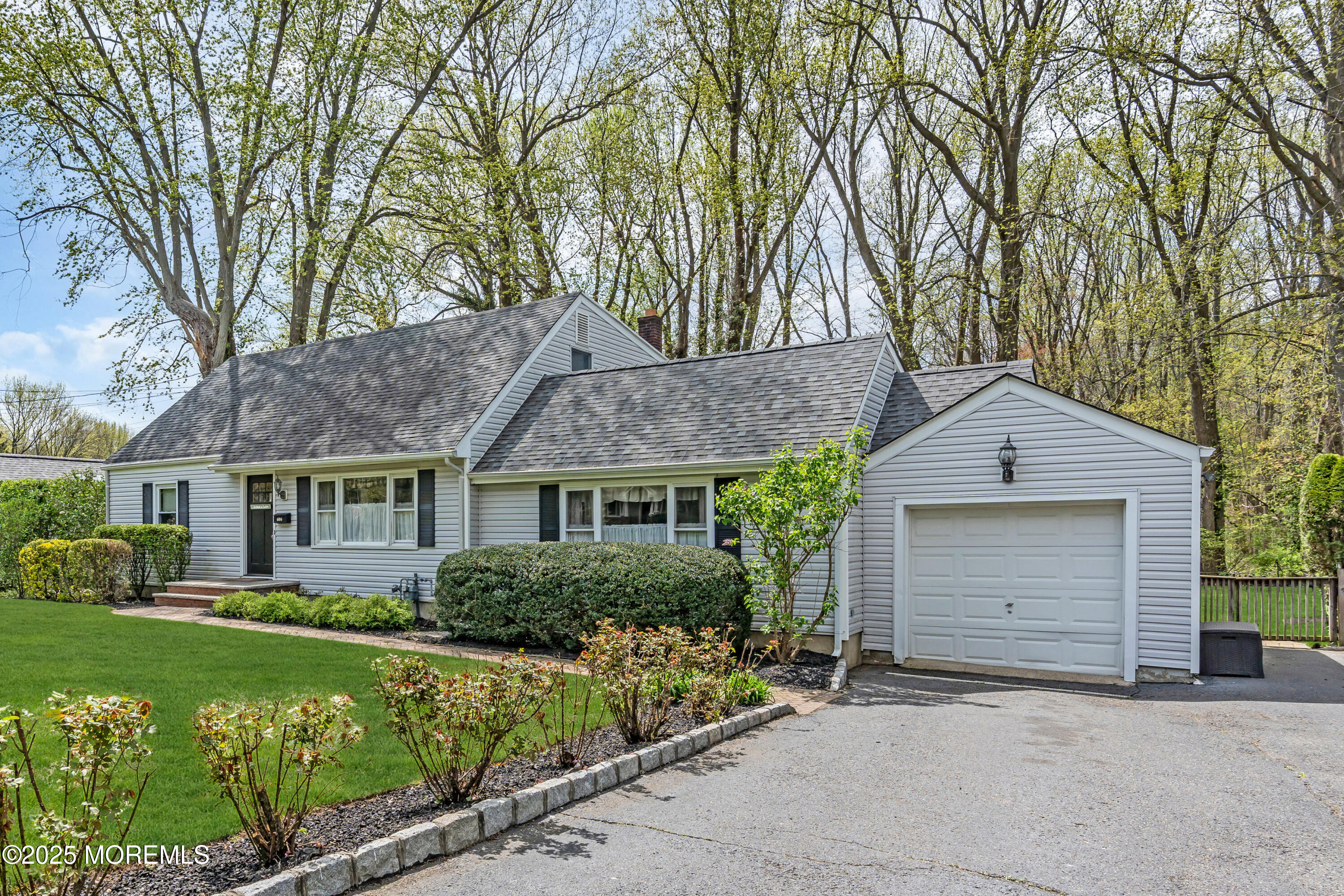 606 E Road Middletown, NJ 07748 - Photo 2 of 28 front view of house with a yard