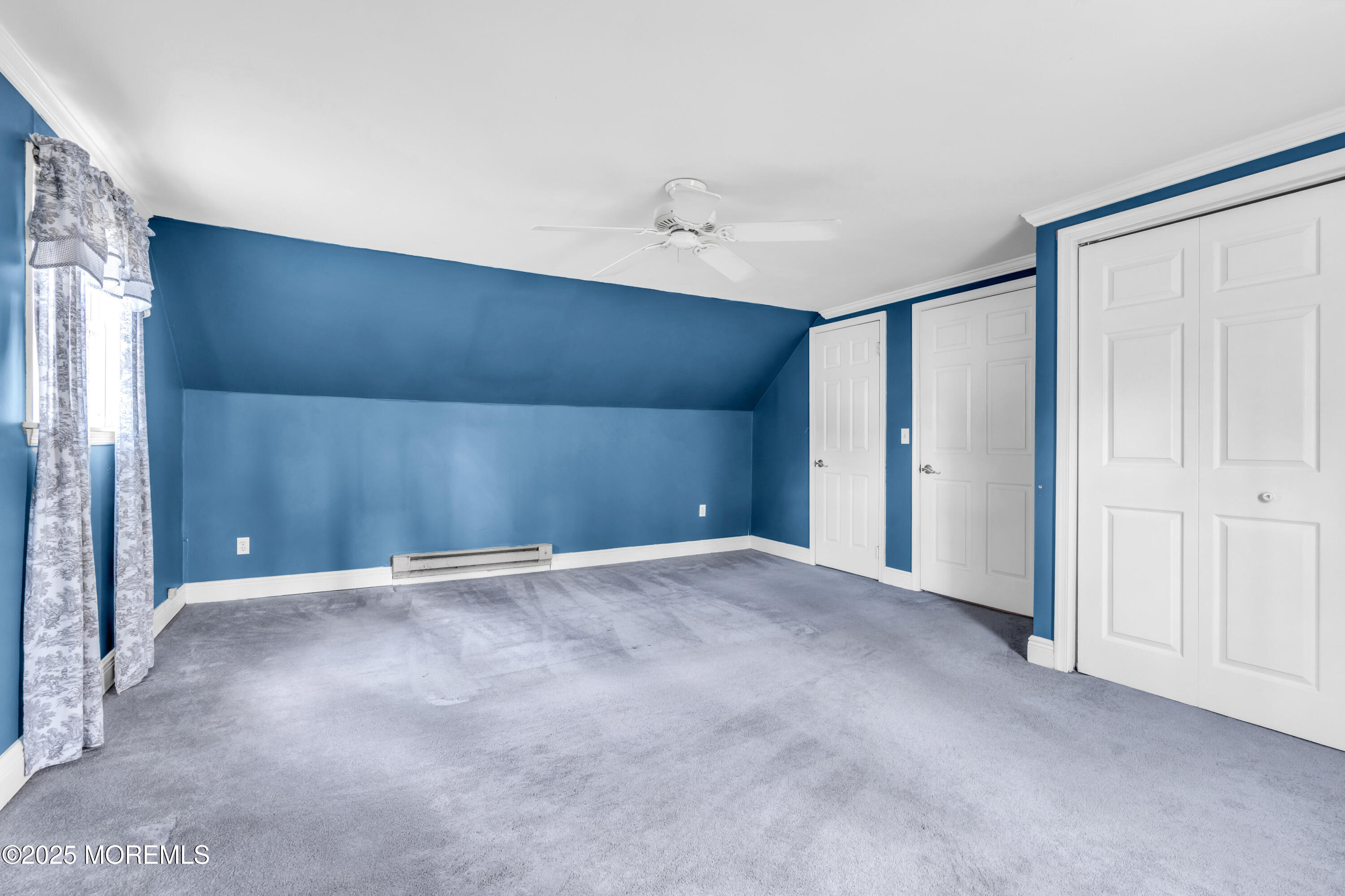 606 E Road Middletown, NJ 07748 - Photo 23 of 28 a view of an empty room with a window