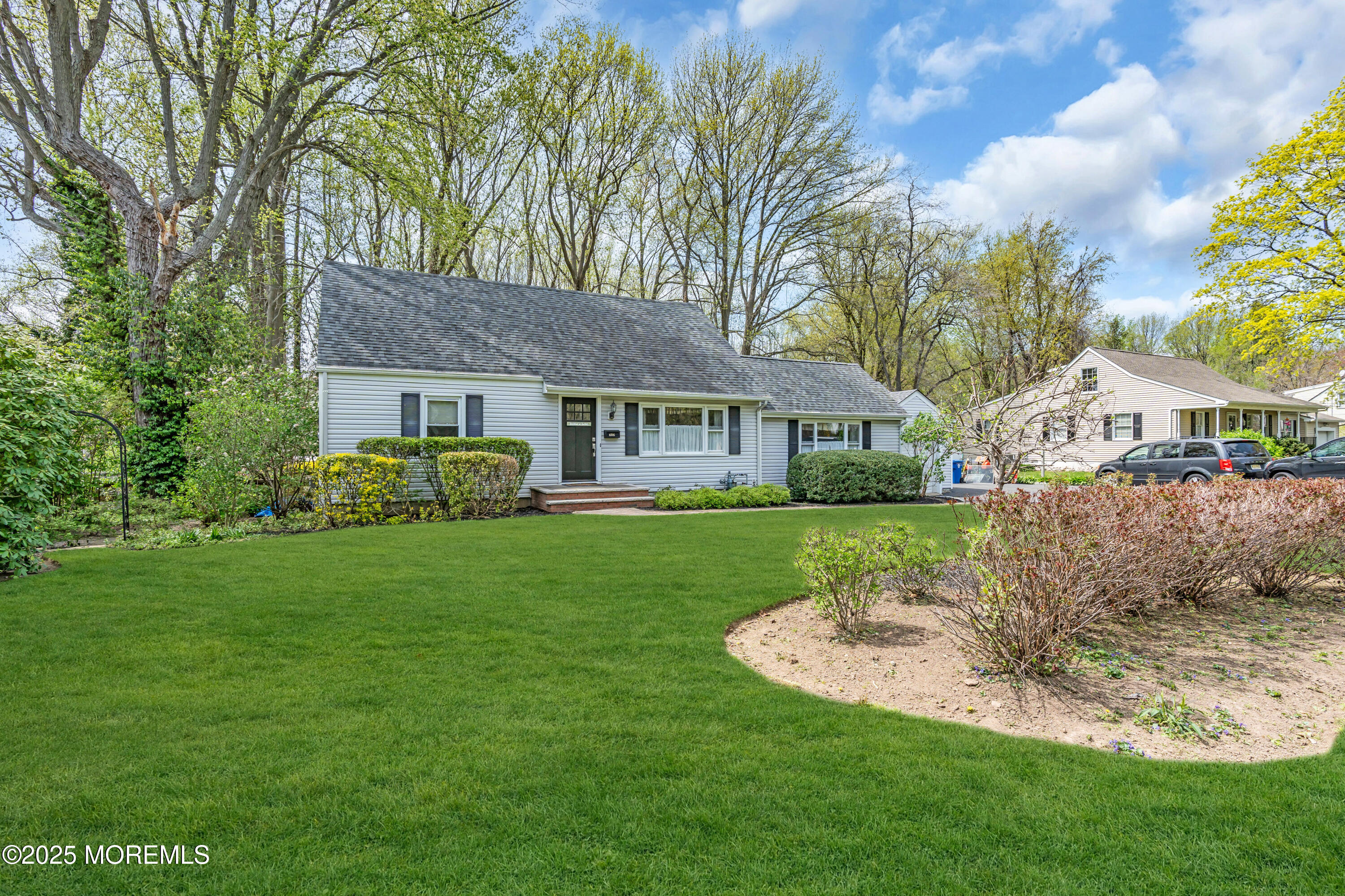 606 E Road Middletown, NJ 07748 - Photo 3 of 28 a view of house that has a yard