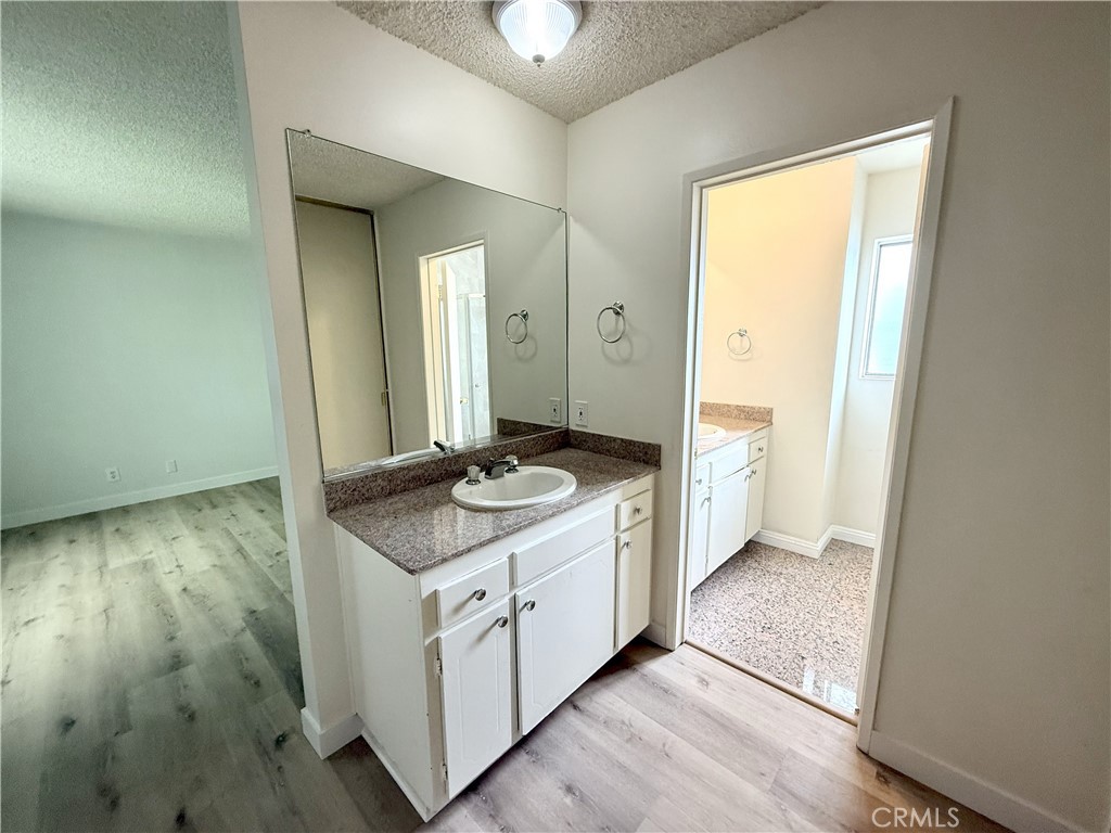1301 South Atlantic Boulevard, Unit 234C Monterey Park, CA 91754 - Photo 17 of 27 a hallway with washer and dryer