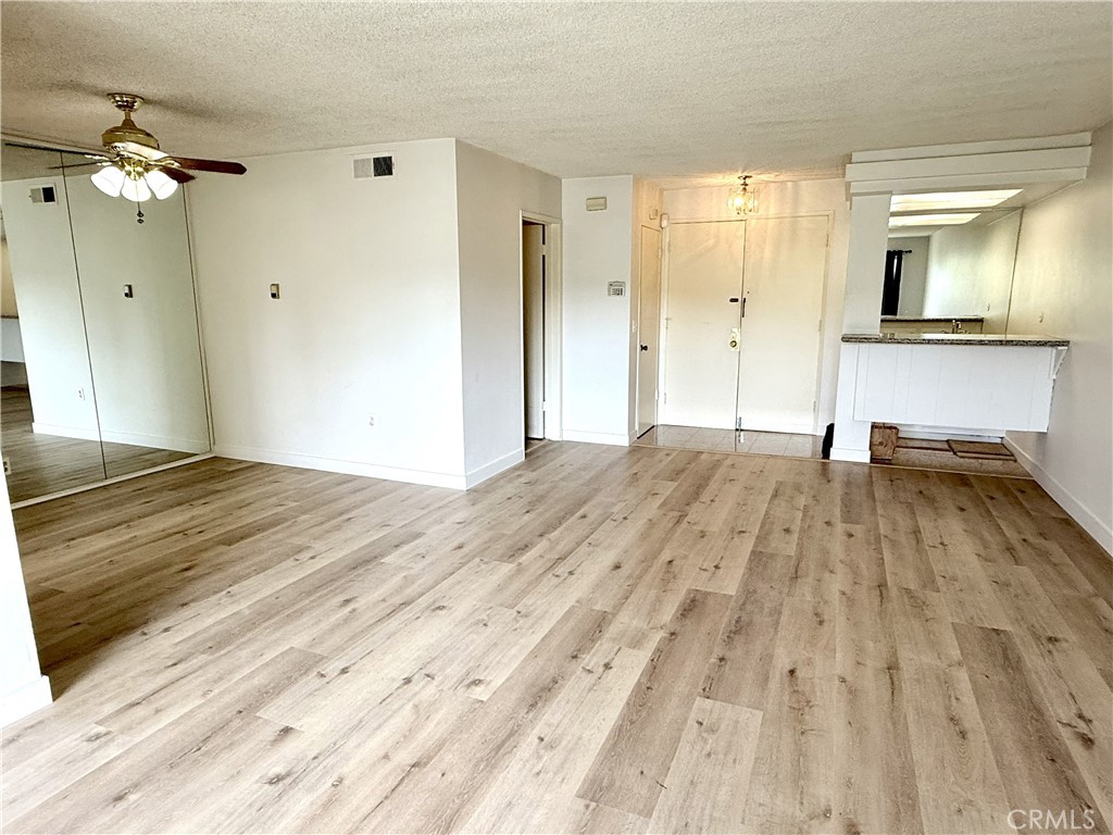 1301 South Atlantic Boulevard, Unit 234C Monterey Park, CA 91754 - Photo 2 of 27 a view of empty room with wooden floor