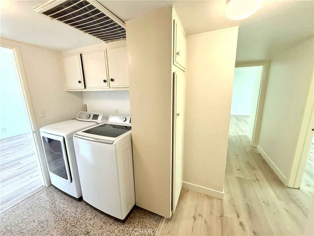 1301 South Atlantic Boulevard, Unit 234C Monterey Park, CA 91754 - Photo 23 of 27 a utility room with dryer and washer