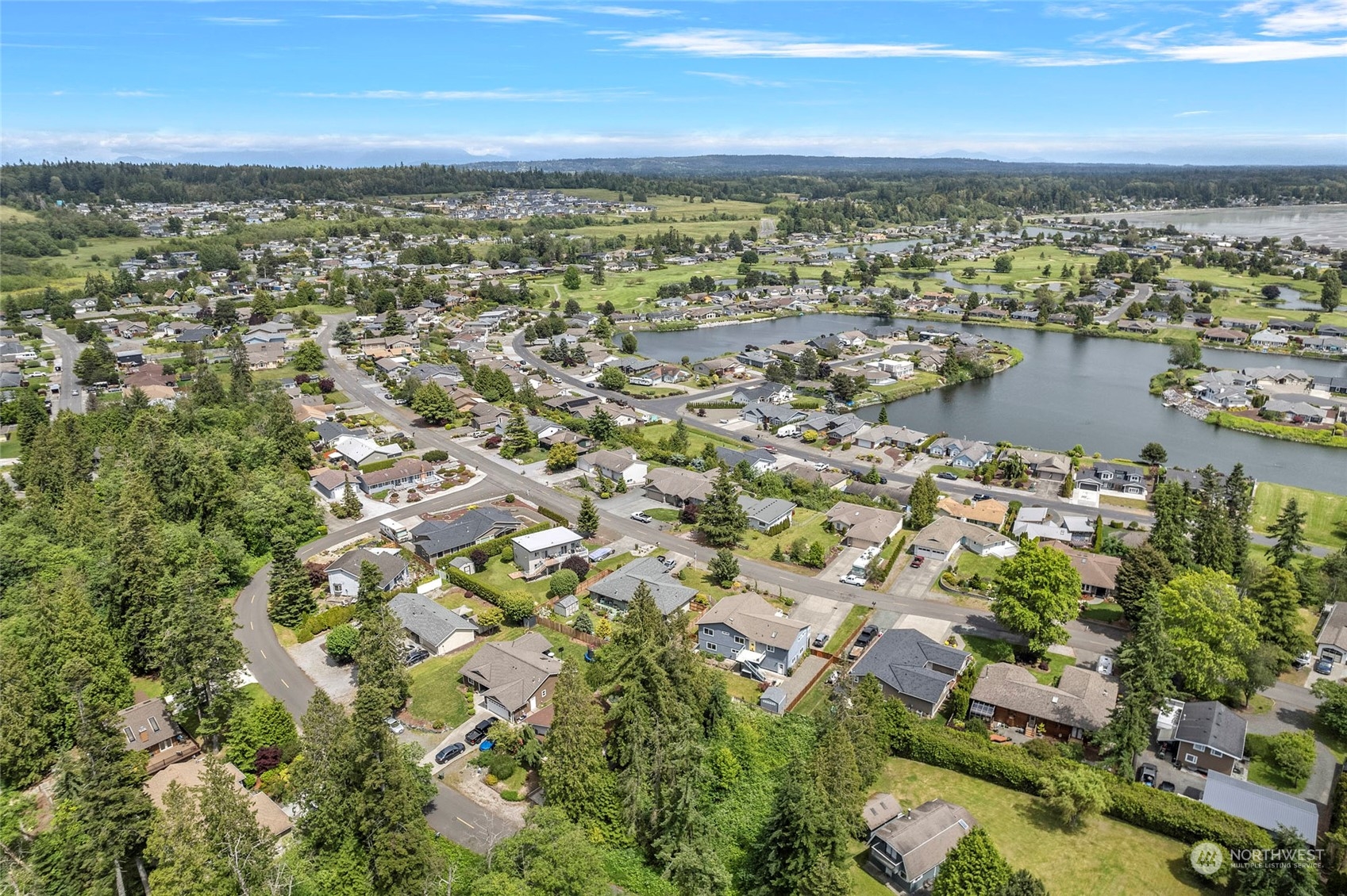 8142 Comox Loop Blaine, WA 98230 - Photo 15 of 17 an aerial view of residential building and lake