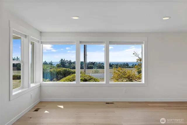 a view of a living room and dining room