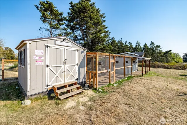 an aerial view of a house with a lake view