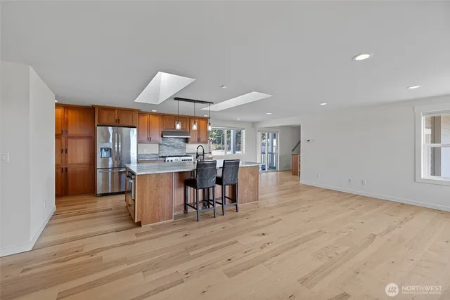 a view of a kitchen and dining room