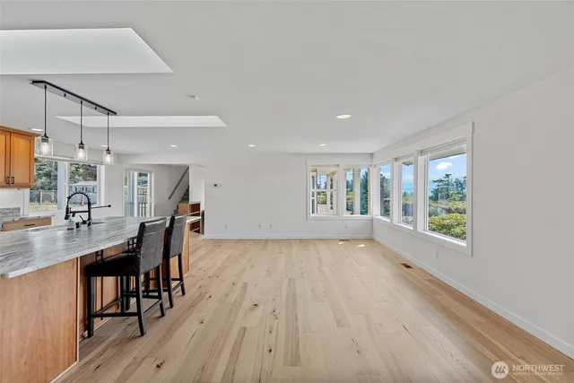 a view of a kitchen and dining room