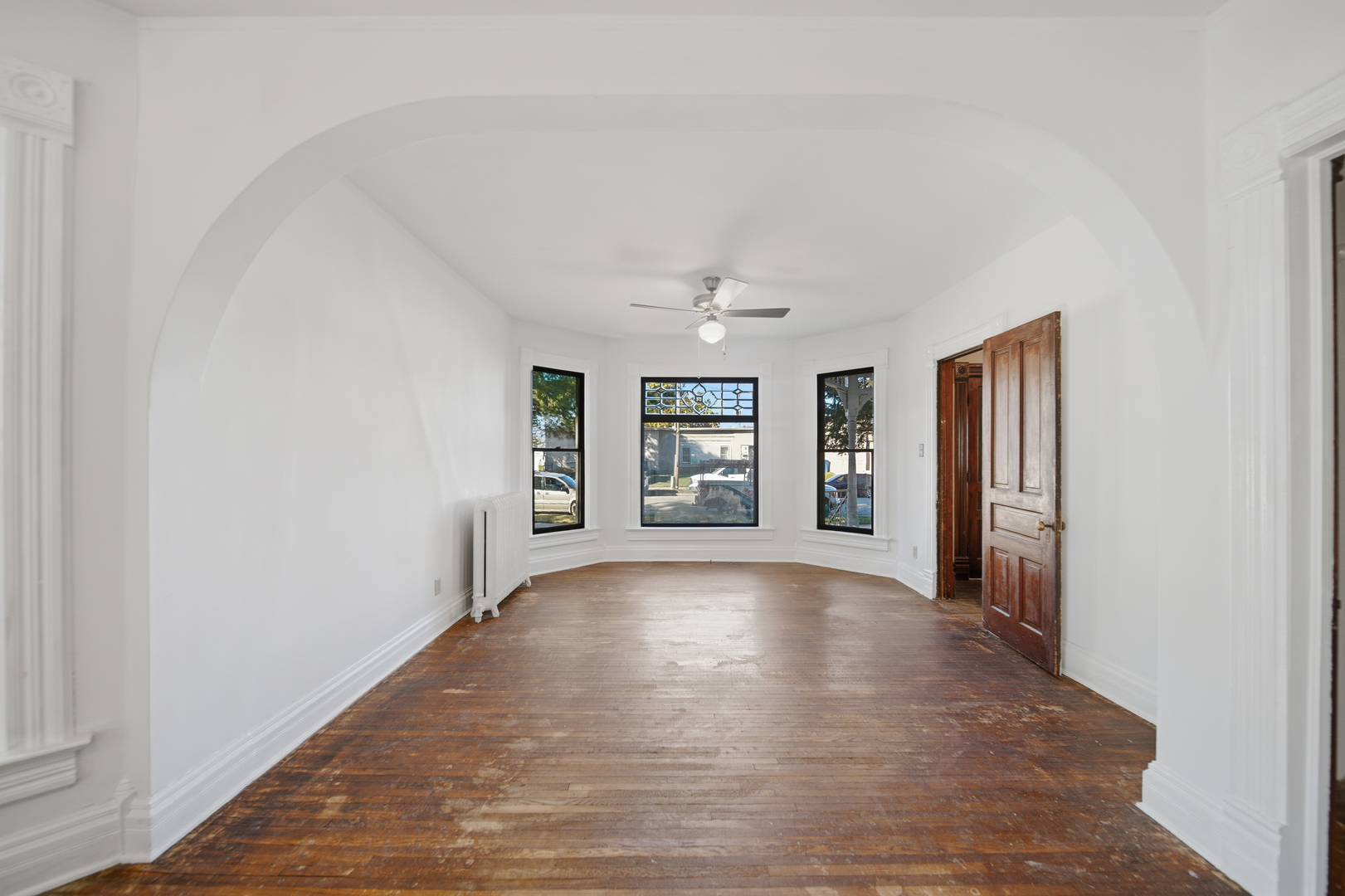 1102 West 3rd Street Dixon, IL 61021 - Photo 14 of 32 wooden floor in an empty room with a window