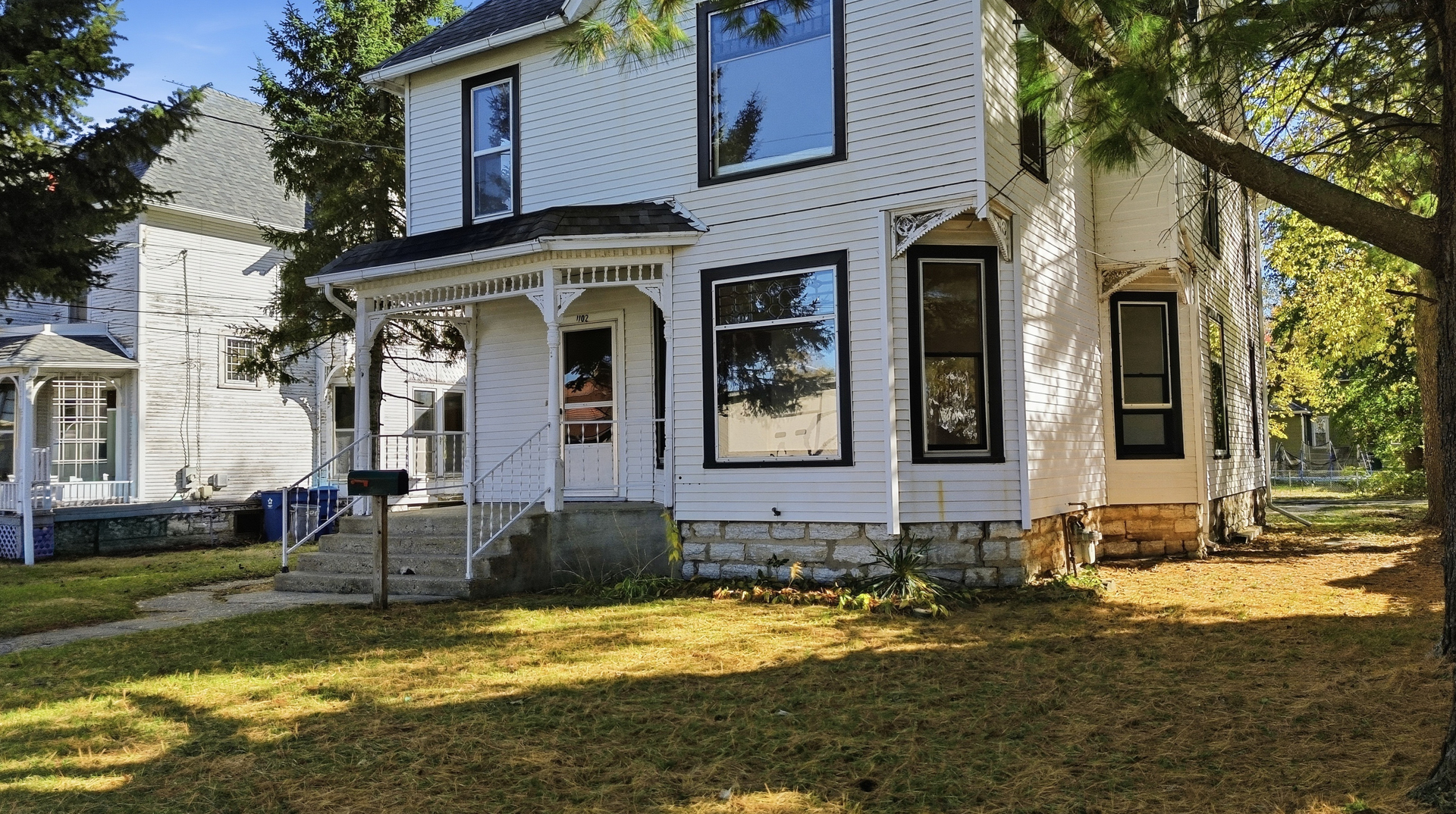 1102 West 3rd Street Dixon, IL 61021 - Photo 2 of 32 a front view of a house with a yard