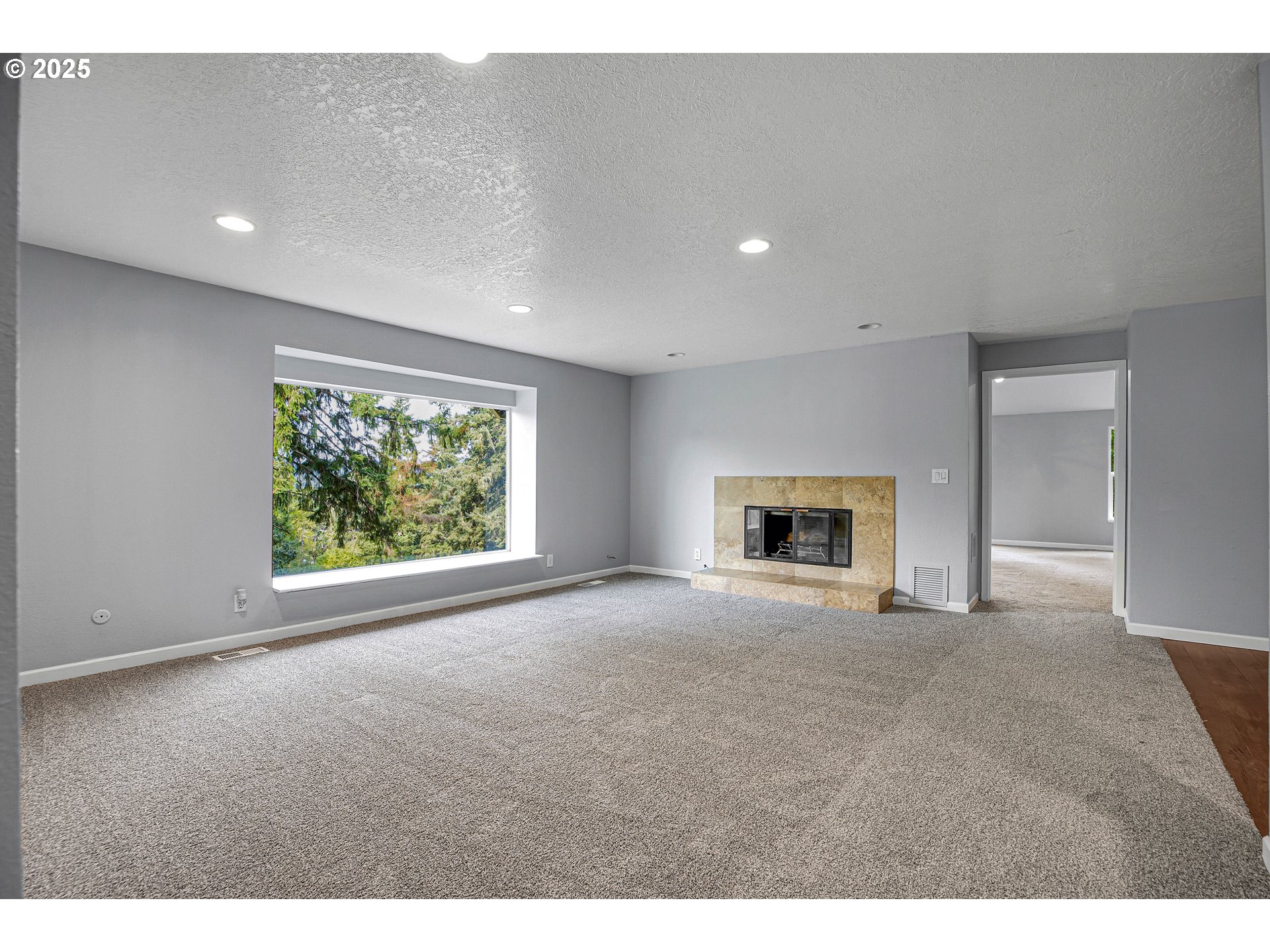 22486 South Redland Road Estacada, OR 97023 - Photo 16 of 46 a view of empty room with window and fireplace