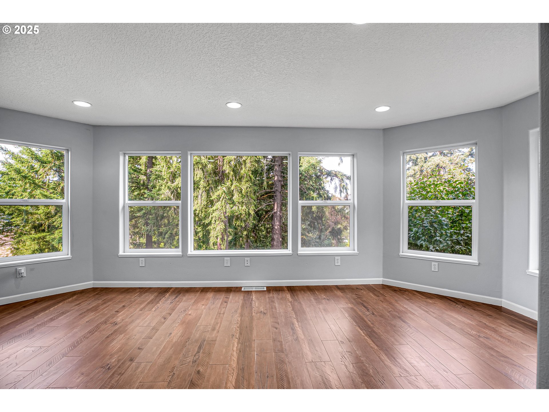 22486 South Redland Road Estacada, OR 97023 - Photo 23 of 46 an empty room with wooden floor and windows